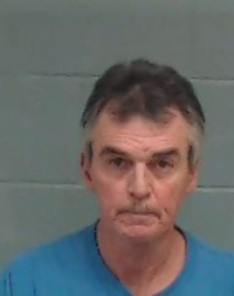 Two arrested after warrants served